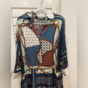 Printed dress with pleated bottom